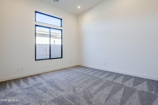 view of carpeted spare room