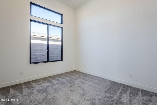 unfurnished room with carpet