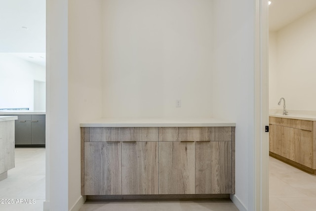 bathroom with vanity and tile patterned floors