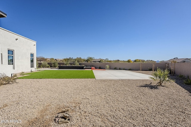 view of yard with a patio