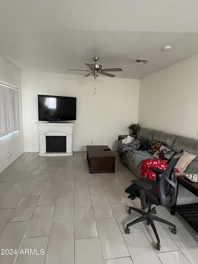 living room with ceiling fan