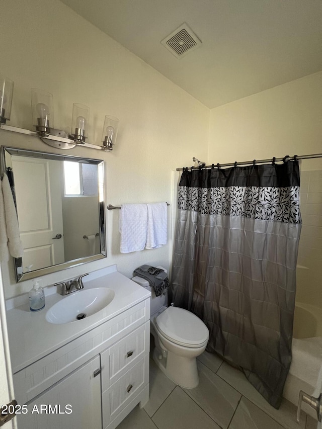 full bathroom featuring toilet, tile patterned floors, shower / bathtub combination with curtain, and vanity