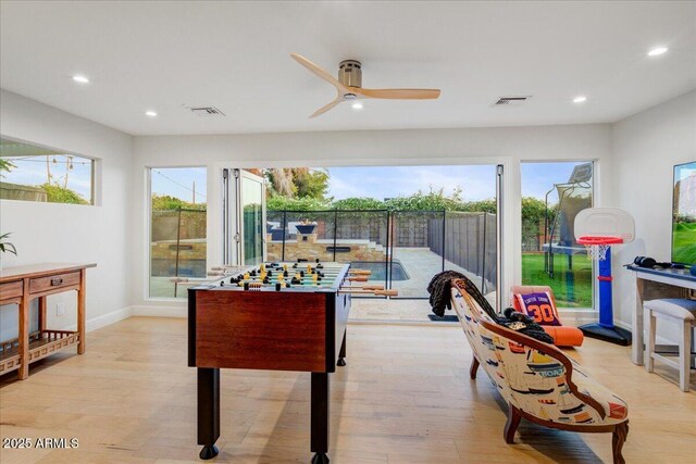 1831 E Rovey Ave, Phoenix, AZ 85016 - game room with recessed lighting, a ceiling fan, light wood finished floors, and plenty of natural light
