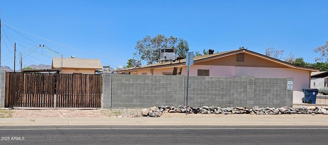 1586 S Lawther Dr, Apache Junction, AZ 85120 - view of property exterior with central air condition unit