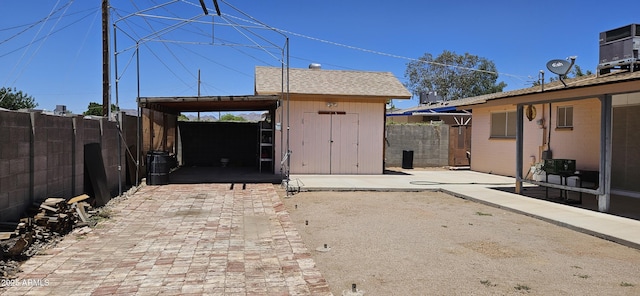 1586 S Lawther Dr, Apache Junction, AZ 85120 - garage featuring a storage unit