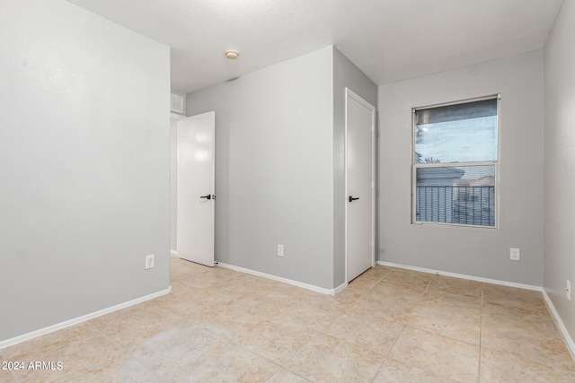 view of tiled empty room