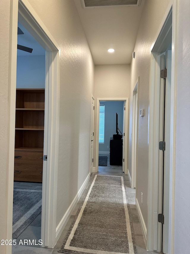 2013 E Valencia Dr, Phoenix, AZ 85042 - corridor featuring baseboards
