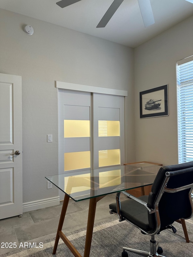 2013 E Valencia Dr, Phoenix, AZ 85042 - office with a ceiling fan and baseboards