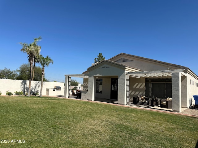2013 E Valencia Dr, Phoenix, AZ 85042 - rear view of house with outdoor lounge area, stucco siding, and a patio
