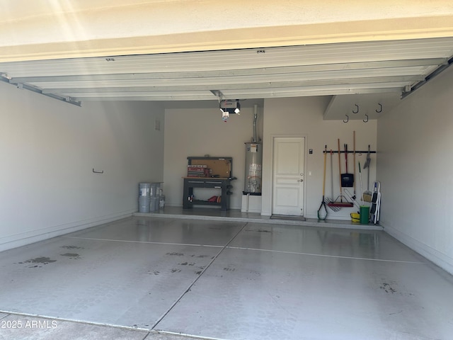 2013 E Valencia Dr, Phoenix, AZ 85042 - garage with gas water heater and baseboards