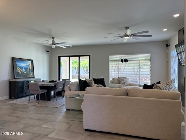 2013 E Valencia Dr, Phoenix, AZ 85042 - living area with a ceiling fan, recessed lighting, and baseboards