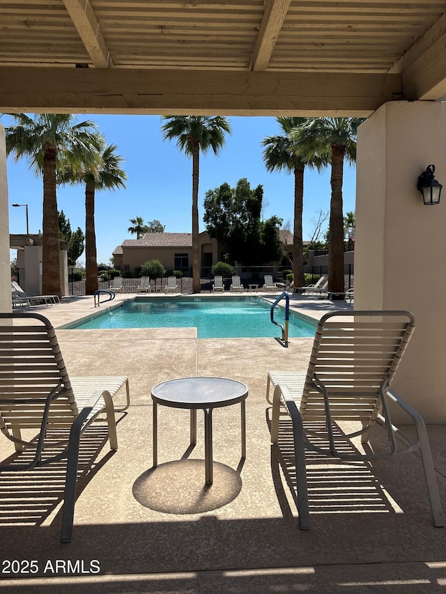 2013 E Valencia Dr, Phoenix, AZ 85042 - community pool with a patio