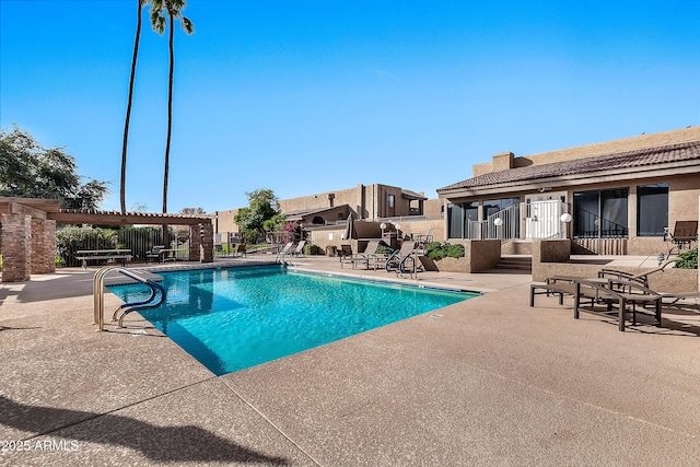 3825 E Camelback Rd Unit 182, Phoenix, AZ 85018 - community pool featuring a patio and a pergola