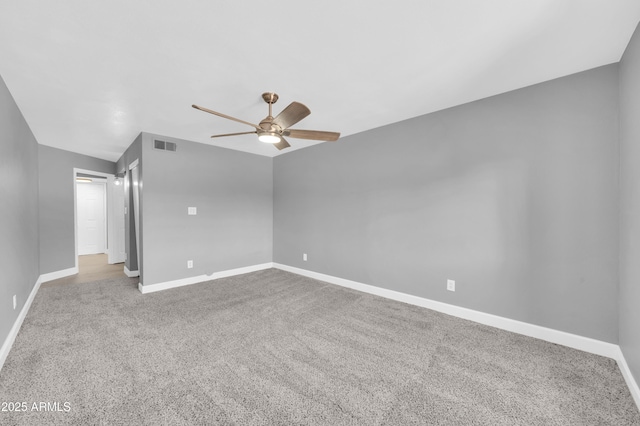 3825 E Camelback Rd Unit 182, Phoenix, AZ 85018 - carpeted spare room featuring a ceiling fan and baseboards