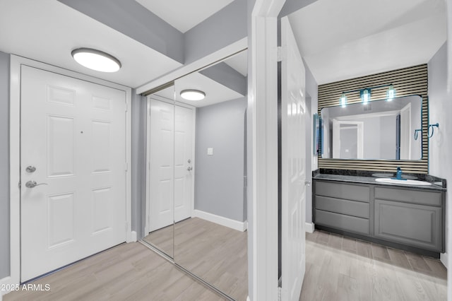 3825 E Camelback Rd Unit 182, Phoenix, AZ 85018 - foyer with light wood-type flooring and baseboards