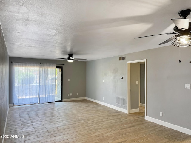 3825 E Camelback Rd Unit 182, Phoenix, AZ 85018 - empty room with a ceiling fan and light wood-type flooring