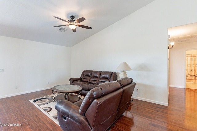 living room with vaulted ceiling, ceiling fan, and dark hardwood / wood-style flooring