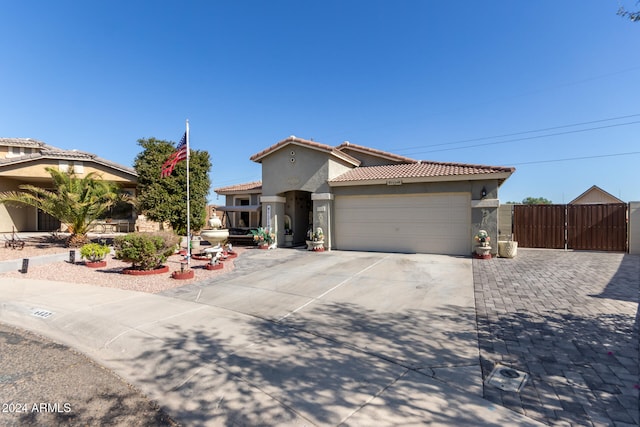 view of front of property with a garage