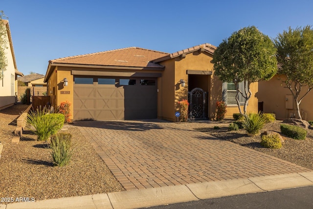 view of front of home with a garage