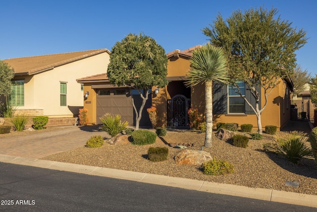 view of front of property featuring a garage