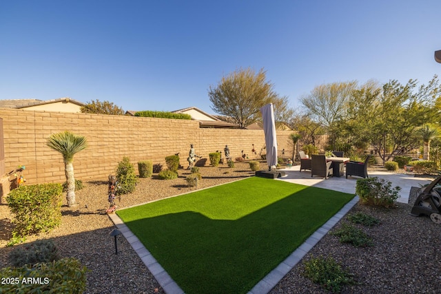 view of yard with a patio area