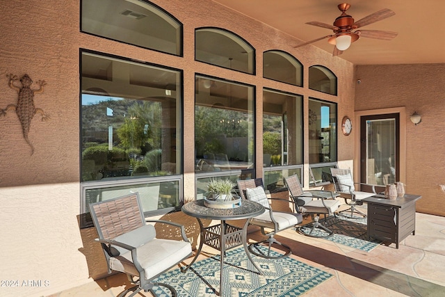 view of patio with ceiling fan