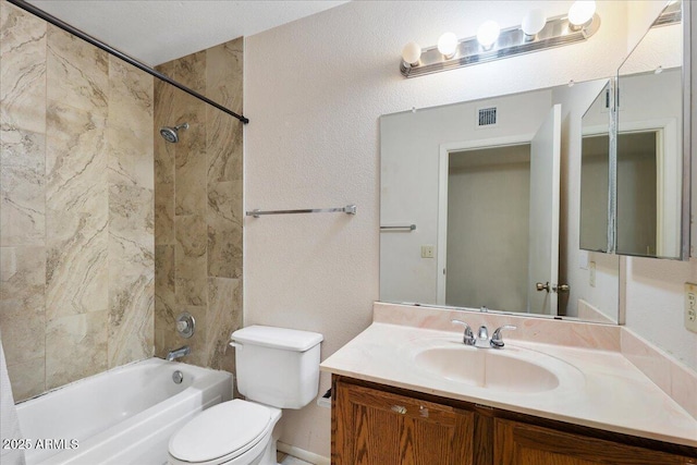 full bathroom featuring vanity, visible vents, bathtub / shower combination, and toilet