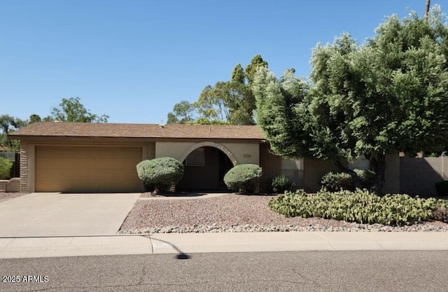 3924 E Cortez St, Phoenix, AZ 85028 - view of front of property featuring an attached garage and concrete driveway