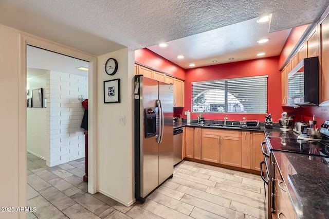 3924 E Cortez St, Phoenix, AZ 85028 - kitchen with appliances with stainless steel finishes, a textured ceiling, recessed lighting, and light brown cabinetry