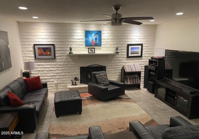 3924 E Cortez St, Phoenix, AZ 85028 - living room with a brick fireplace, ceiling fan, and recessed lighting