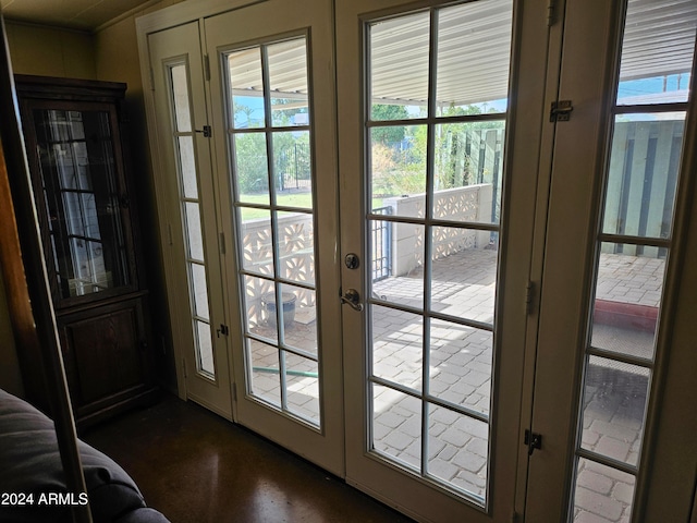 doorway to outside with plenty of natural light and french doors