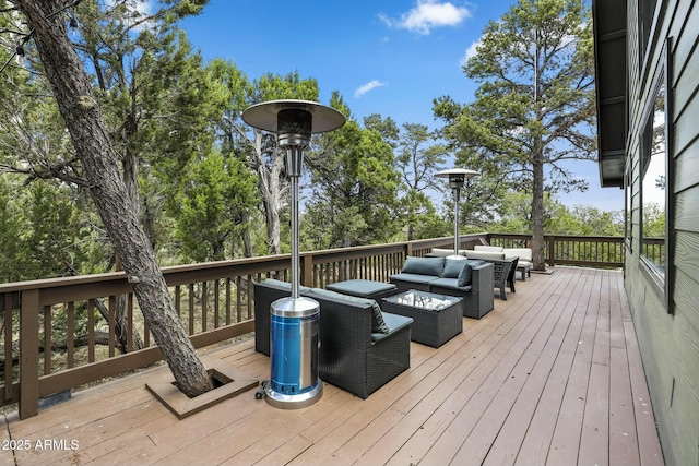 deck featuring outdoor lounge area