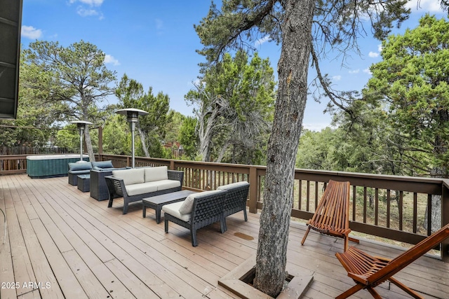 wooden terrace featuring an outdoor hangout area