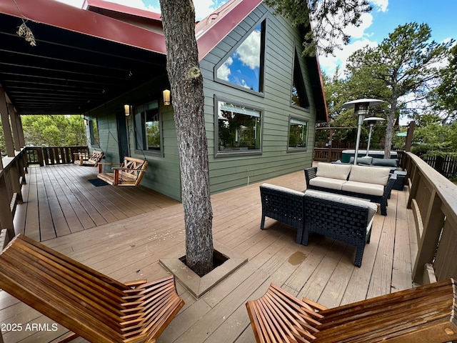 wooden deck with outdoor lounge area