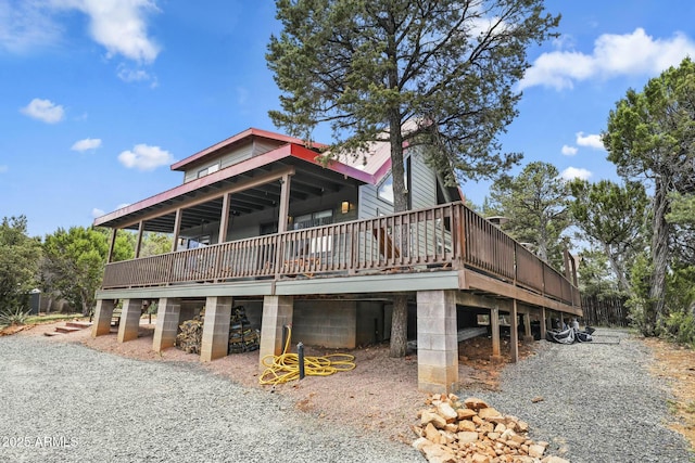 exterior space featuring a wooden deck