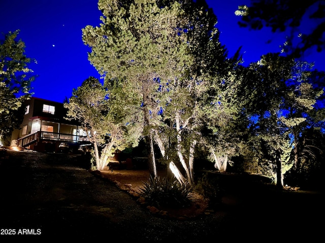 view of property exterior at twilight