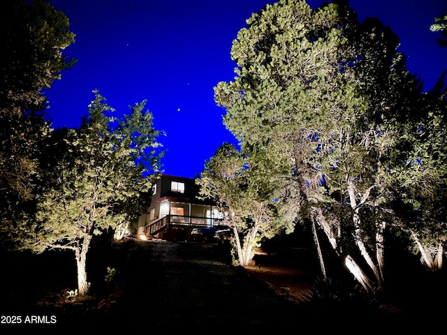 view of property exterior at night