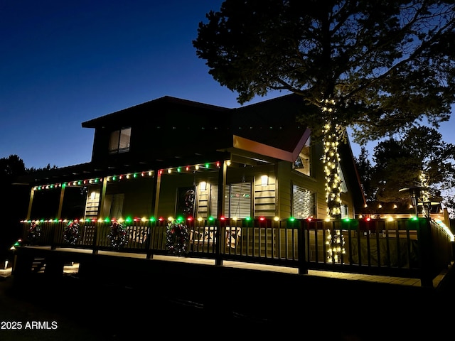 view of property exterior at twilight