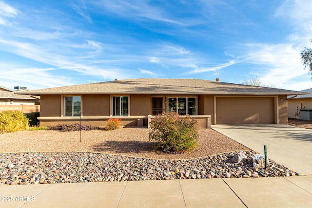 ranch-style home with a garage