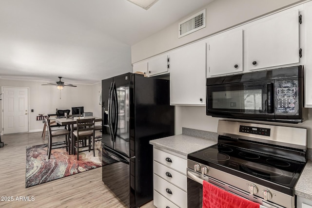 kitchen with white cabinetry, light hardwood / wood-style flooring, ceiling fan, and black appliances