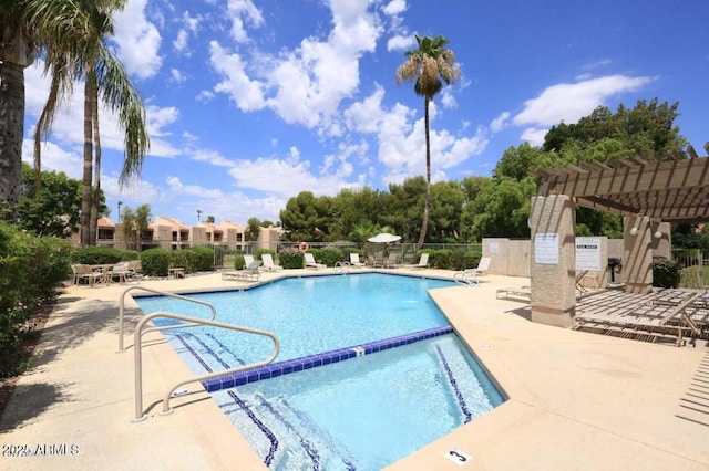 view of pool featuring a pergola and a patio area