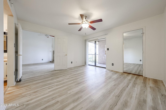 unfurnished bedroom with ceiling fan, access to exterior, and light hardwood / wood-style flooring