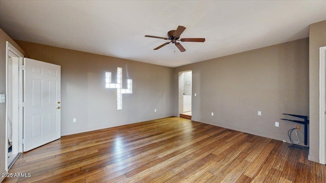 interior space with ceiling fan and hardwood / wood-style flooring