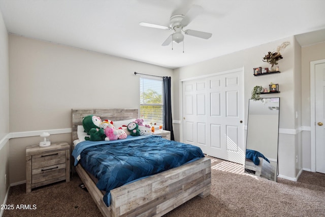 bedroom with a closet, ceiling fan, baseboards, and carpet floors