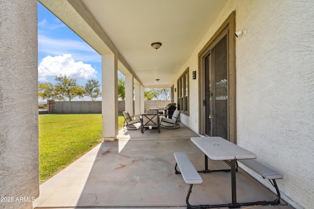 view of patio with a fenced backyard