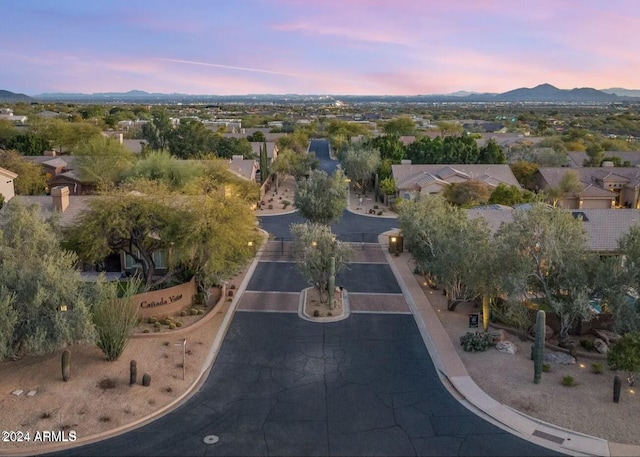 aerial view at dusk with a mountain view