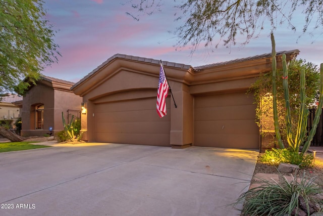 view of front of house with a garage