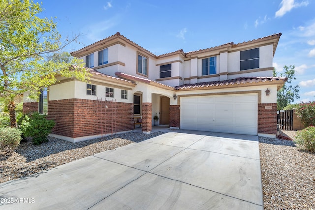 27053 N 172nd Ln, Surprise, AZ 85387 - mediterranean / spanish-style home with brick siding, concrete driveway, a garage, and stucco siding