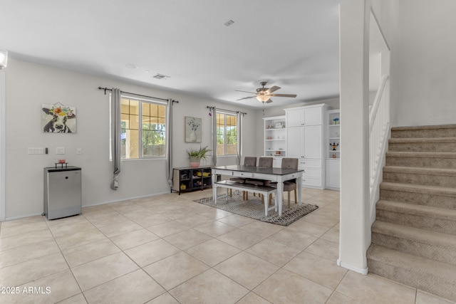 27053 N 172nd Ln, Surprise, AZ 85387 - dining area featuring stairs, ceiling fan, and light tile patterned floors