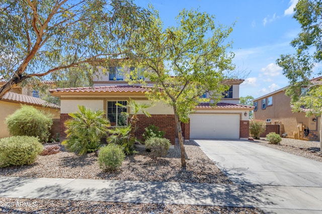 27053 N 172nd Ln, Surprise, AZ 85387 - view of front of house featuring driveway, a garage, stucco siding, and a tile roof